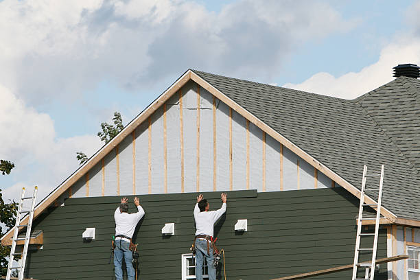 Professional Emergency Siding Repair technician working in Lakeview, GA